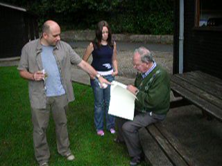 Gerry having his first look at the birthday book, August 2006