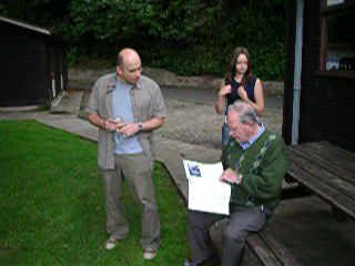 Gerry having his first look at the birthday book, August 2006