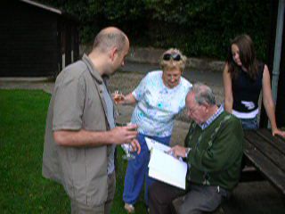 Gerry having his first look at the birthday book, August 2006