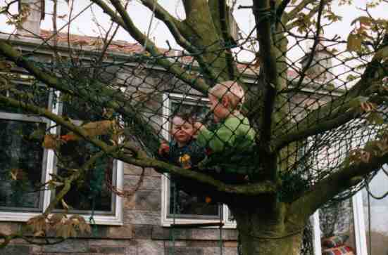 Eoghan and Danny having a picnic in a tree